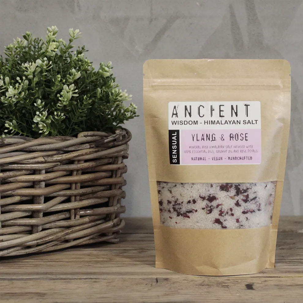 Himalayan bath salt sensual pack with a plant in the background