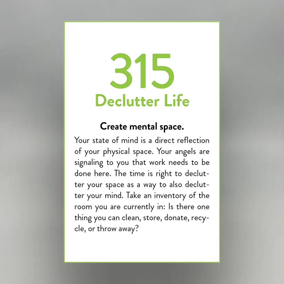 Oracle Card with text on decluttering life on a gray background