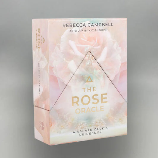 The Rose Oracle card deck packaging with Rebecca Campbell's name on a gray background