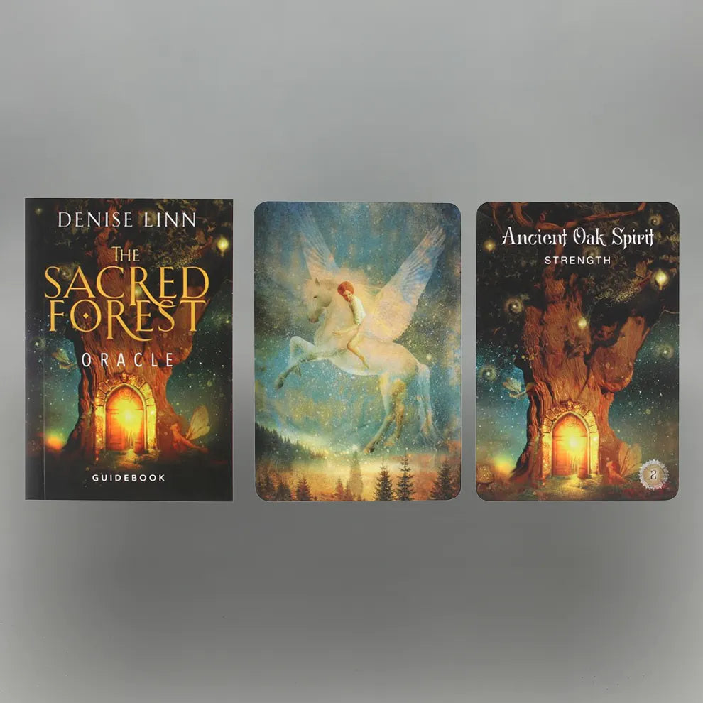 The Sacred Forest Oracle guidebook and two cards on a gray background