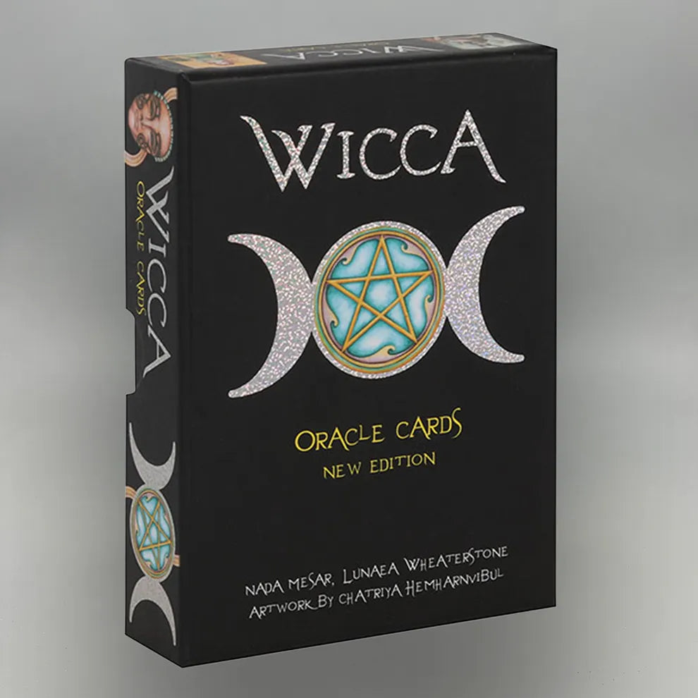 Wicca Oracle Cards packaging with triple moon symbol on a gray background